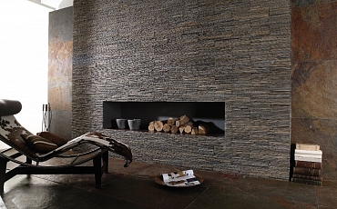 Облицовка камина камнем - это классика, которая никогда не устареет